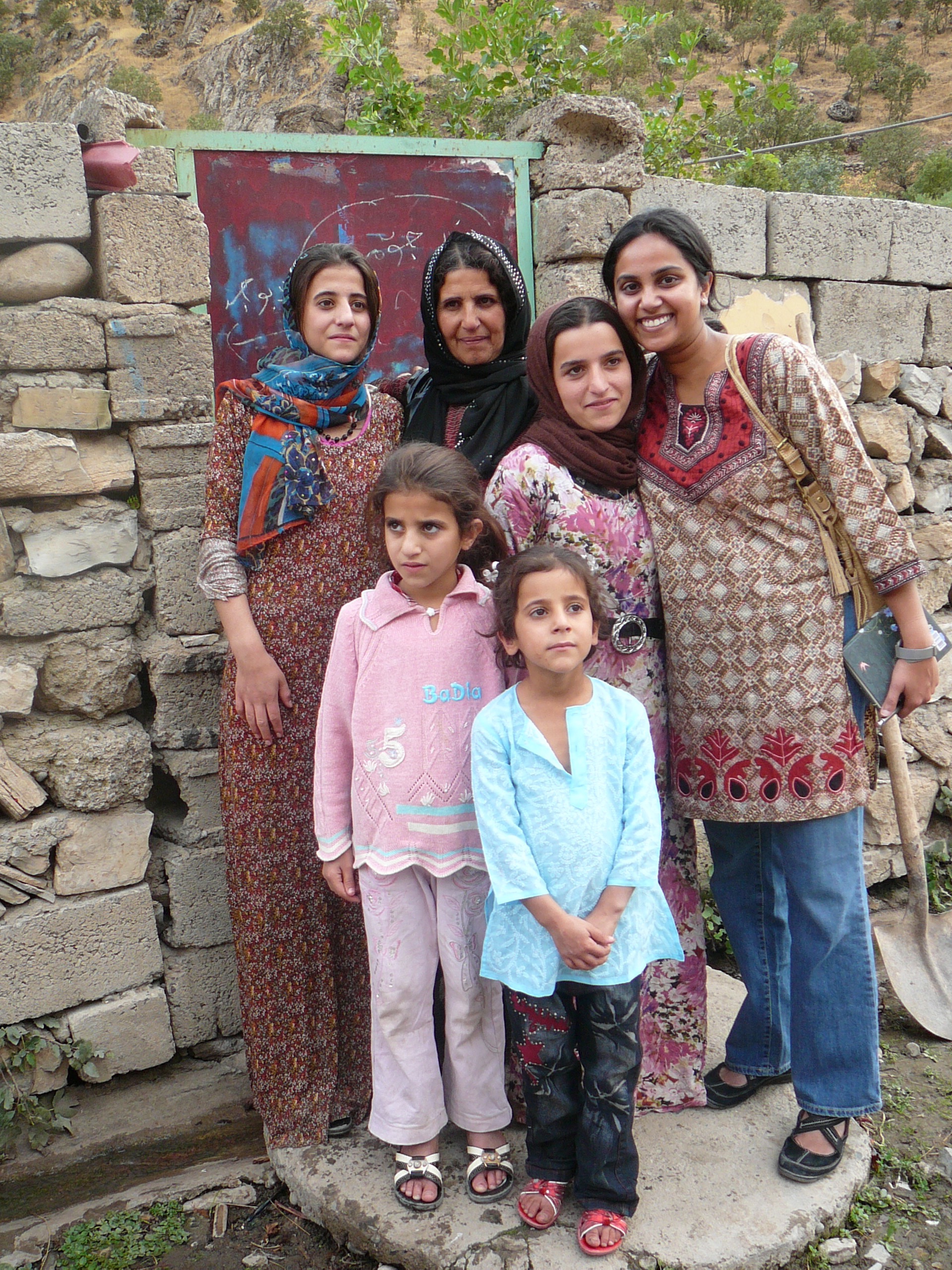 Babita Rusyn seen here with refugees during a missions trip to Iraq.